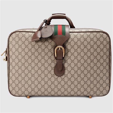 gucci supreme suitcase